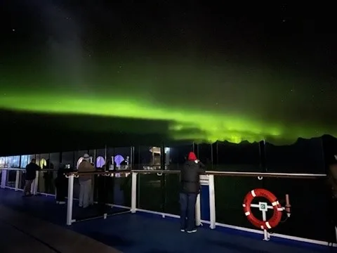 Aurora Borealis blazing over the ship's open deck — Alaska — Aurora Borealis and Inside Passage