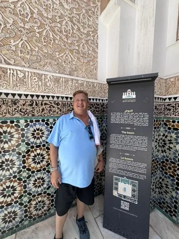 Scott inside a richly decorated palace — Marrakesh, Morocco