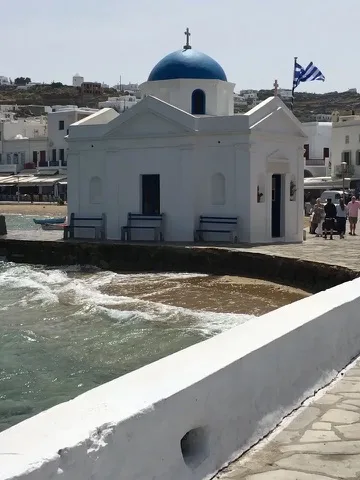 Blue-domed seaside chapel — Mykonos