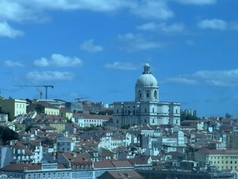 Lisbon's tiled rooftops and dome — Lisbon
