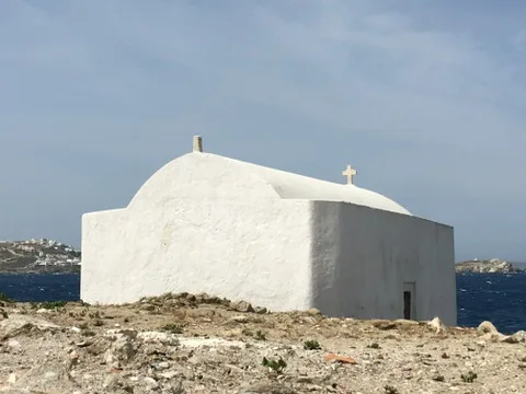 Mykonos — Aegean white and blue — the landmark in its setting