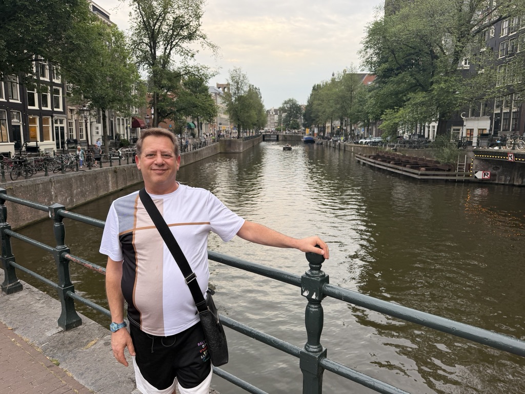 Scott Astin beside an Amsterdam canal