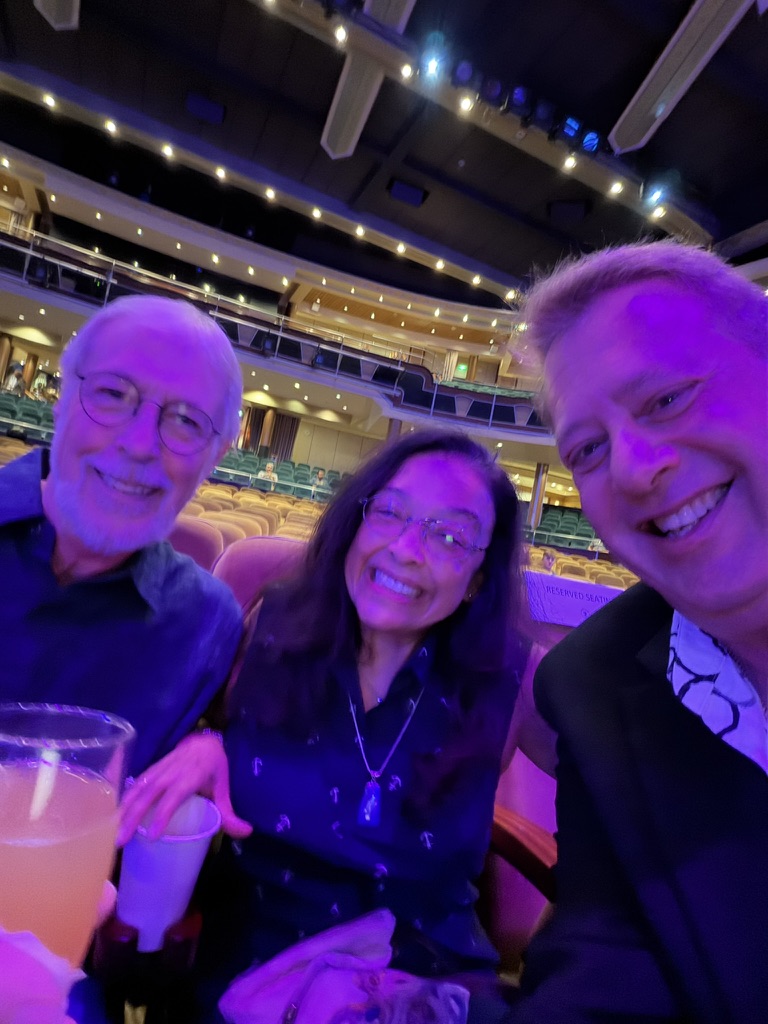 Scott Astin taking a theater selfie with friends during his Pinnacle celebration